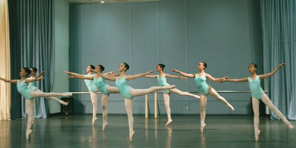 Side view of a man holding a plank position with perfect form.